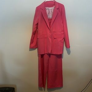 Women’s pink suit